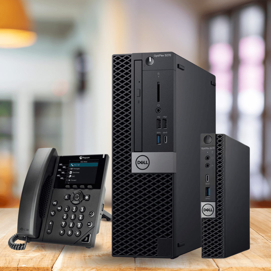 A call center phone next to a dell desktop from Evergreen