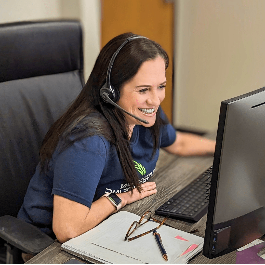 Evergreen Electronics, Inc. employee on the phone offering excellent customer support to a client.